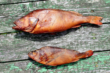 Smoked carcasses of perch fish