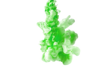 Abstract flowing liquid or green ink in water on a white background. zero gravity.