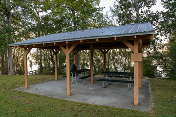 Picnic Pavilion in a Wooded Park with Picnic Tables