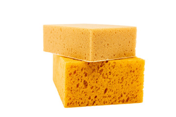 closeup cleaning sponge over white background