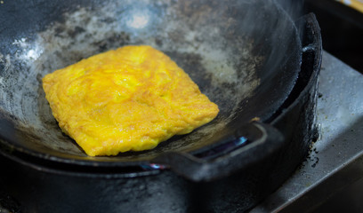 Stuffed eggs on pan..