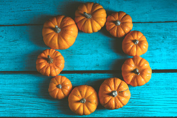 Pumpkins on old rusrik wooden. Thanksgiving day