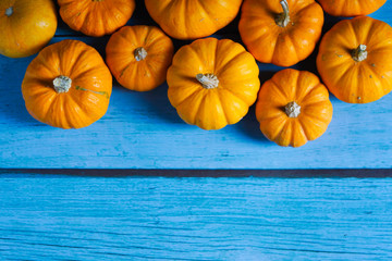 Pumpkins on old rusrik wooden. Thanksgiving day