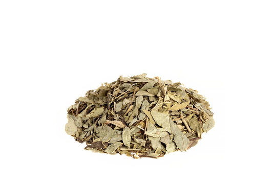 Pile of dried Senna, Senna Alexandrina leaves isolated on white background.