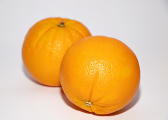 Fresh oranges isolated on white background