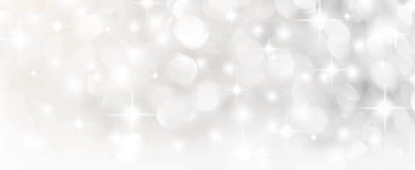 abstract blur white and silver color panoramic background with star glittering light for show,promote and advertisee product and content in merry christmas and happy new year season collection concept