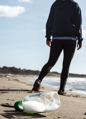 young woman walking on the beach