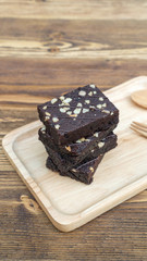 Brownies cake on a wooden table.