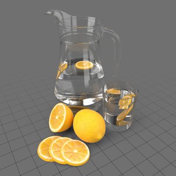 Jug and glass with lemon slices