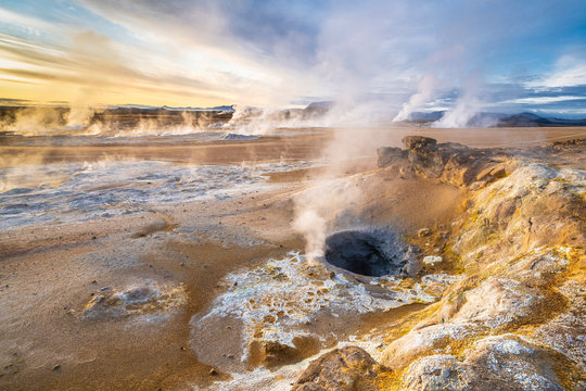 steaming mud holes and solfataras in the geothermal area of Hverir near lake Myvatn, northern Iceland - Powered by Adobe