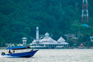 Kecil, Perhentian Islands, Malaysia; 19-May-2019; the boat and the mosque, Kecil, Perhentian Islands, Malaysia
