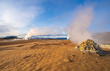 steaming mud holes and solfataras in the geothermal area of Hverir near lake Myvatn, northern Iceland