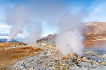 steaming mud holes and solfataras in the geothermal area of Hverir near lake Myvatn, northern Iceland