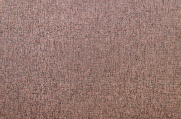 Naklejka na ściany i meble Background from a rough dark brown fabric for upholstery