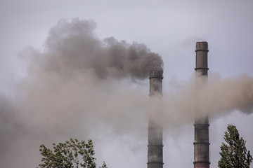 Smoke from the pipes of heat station