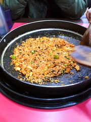 portion of fried rice in frying pan in local cafe