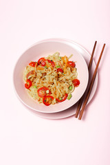 Vegan noodles with peas, peppers, onion and zucchini