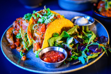 Mexican Tacos With Prawns, Salad and Salsa Sauce. Authentic Shoot from Restaurant.
