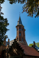The observation place. Tower. Street view of beautiful historic city center architecture of Bruges or Brugge, West Flanders province, Belgium. Lovely summer August weather