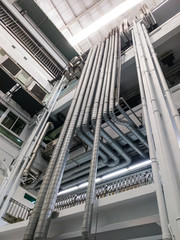 The complex metal pipe of the ventilation system.