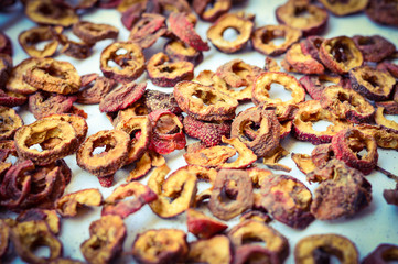 The Red Dried Chinese Hawthorn Placed on White Background. Hawthorn can be used as the traditional Chinese medicine, which helps digestion. Authentic Shot.
