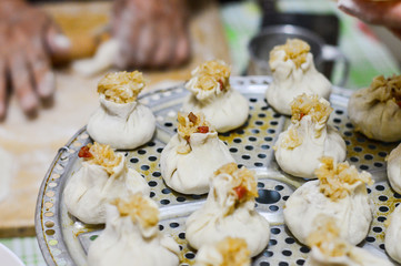 Obraz na płótnie Canvas Chinese Homemade Shaomai, Rice Dumplings, Traditional Chinese Food Closeup.
