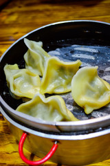 Chinese Steamed Dumplings in Bamboo Steamer