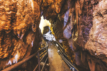 Fototapeta premium Inside limestone caves for speleological sightseeing