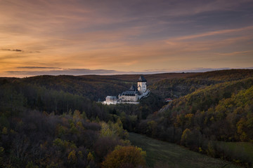 Obraz premium Karlstejn Castle is a large Gothic castle founded 1348 CE by Charles IV, Holy Roman Emperor-elect and King of Bohemia. There are hidden Czech crown jewels, holy relics, and other royal treasures. 