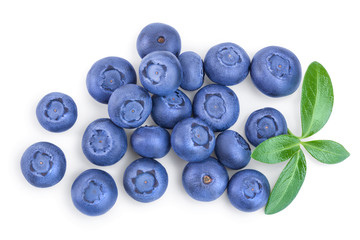 fresh ripe blueberry with leaves isolated on white background. Top view. Flat lay pattern