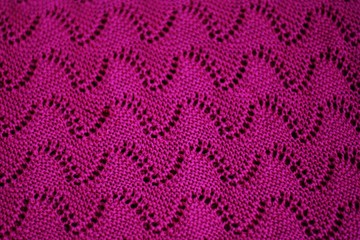 Beautiful knitted pink sweater close up view