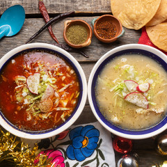 Mexican white  and red pozole with christmas decoration on wooden background