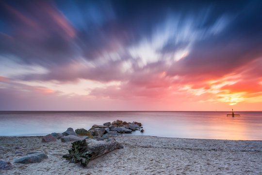Baltic sea beach during sunrise in Gdynia. Baltic Sea. Poland
