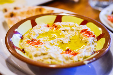 Mutabal Middle Eastern Aubergine (Eggplant) Dip. Pitta Bread Blurred at Background