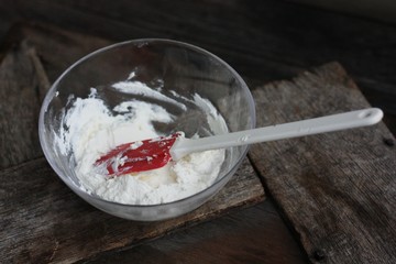 Fresh cottage cheese on a wooden table