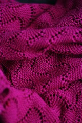 Beautiful knitted pink sweater close up view