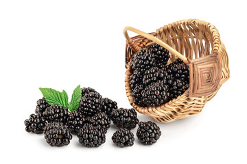 blackberry with leaf in a wicker basket isolated on a white background closeup