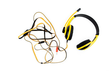 Yellow headphones isolated on a white background.