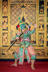 Thai pantomime dance scene Ravana is wielding body weapons.