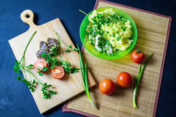 fried potatoes with chop and fresh tomatoes