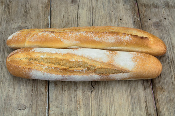 french baguette on a wooden board