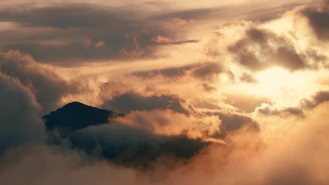 Beautiful sunset mountain ridge with cloud 4k footage in Dolomites Italy