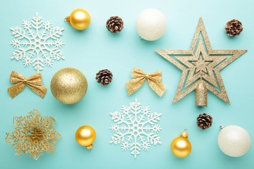 Fototapeta na wymiar Christmas composition with decoration on mint background