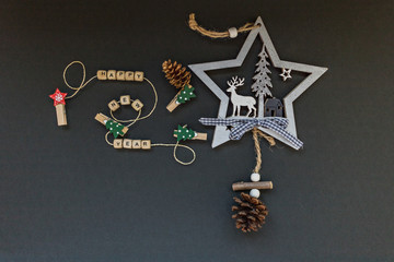 Christmas decorations and attributes of the new year on a black background. Flatlay.