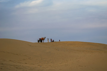 Sam Sand Dunes, Jaisalmer, Rajasthan, India; 24-Feb-2019; camel caravan ride in Thar desert, Jaisalmer, Rajasthan, India