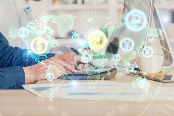 Forex graph with businessman working on computer in office on background. Concept of hardworking. Closeup. Multi exposure.