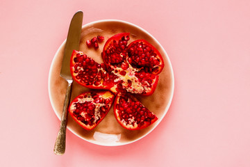 Ripe pomegranate in plate
