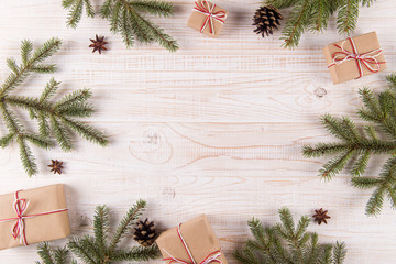 Christmas tree, gifts and pine cones, copy space. Greeting card with place for text.