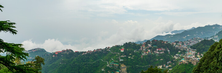 Fototapeta na wymiar A panoramic view of the Mussoorie cityscape from Landour, Uttarakhand, India