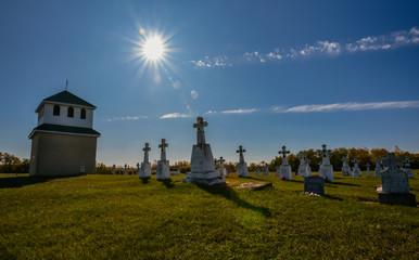 Fototapeta na wymiar Old country cemetery in autumn